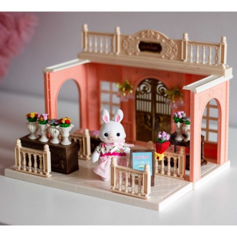 WOOPIE Domek dla Lalek Rodzina Królików Kwiaciarnia + Figurka WOOPIE Domek dla Lalek Rodzina Królików Kwiaciarnia + Figurka