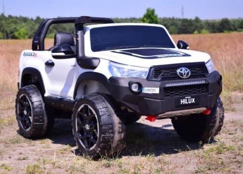ORYGINALNA TOYOTA HILUX, 2X12V10AH W WALIZCE, PANEL SPORT, RADIO FM 4X4/DKHL850 ORYGINALNA TOYOTA HILUX, 2X12V10AH W WALIZCE, PANEL SPORT, RADIO FM 4X4/DKHL850